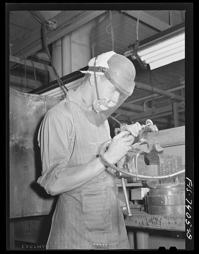 Detroit, Michigan. Learner at the Allison Motors plant