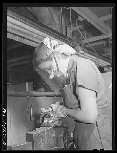Detroit, Michigan. Grinder at the Allison Motors plant