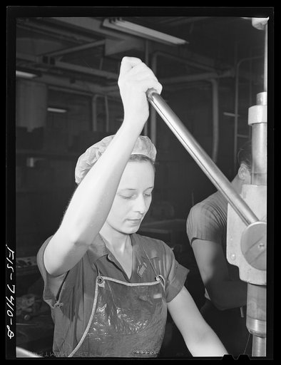 Detroit, Michigan. Drill press operator at the Allison Motors plant