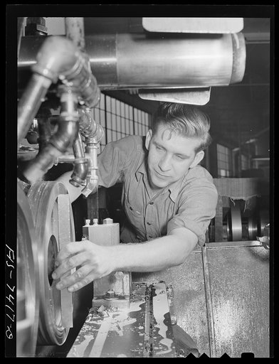 Detroit, Michigan. Lathe operator at the Allison Motors plant