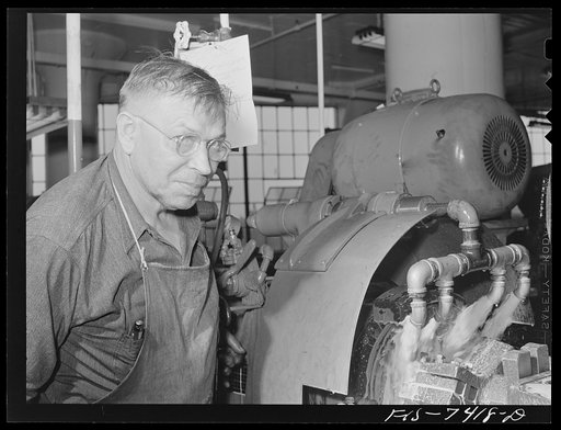Detroit, Michigan. Lathe operator at the Allison Motors plant