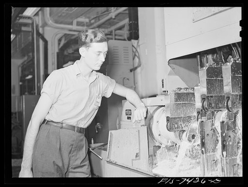 Detroit, Michigan. Lathe operator at the Allison Motors plant