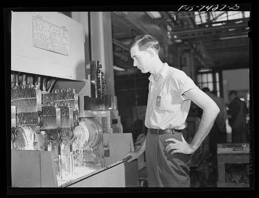 Detroit, Michigan. Lathe operator at the Allison Motors plant