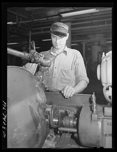 Detroit, Michigan. Lathe operator at the Allison Motors plant