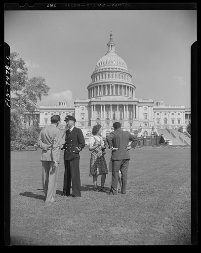Washington, D.C. International student assembly. R. Klimen of the Office of War Information; Sub Lieutenant Richard Miles, of Great Britain; Diana Mowrer, a U.S. delegate, a student at Wellesley College; Abd El Hamid Zaki, a delegate from Egypt