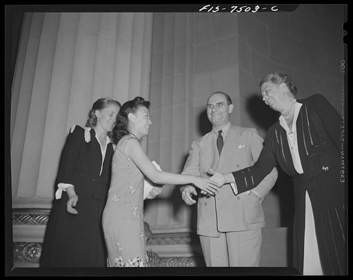 Washington, D.C. International student assembly. Mrs. Roosevelt greeting Wang Yung, a Chinese movie actress