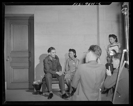 Washington, D.C. International student assembly. Wang Yung, a Chinese movie actress, and Corporal Kazimerz Dziedzioch, a delegate from Poland