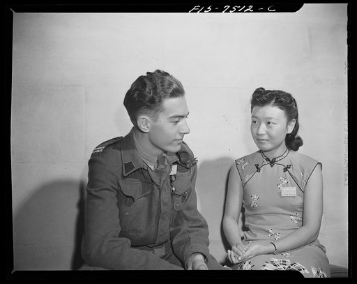 Washington, D.C. International student assembly. Wang Yung, a Chinese movie actress, and Corporal Kazimerz Dziedzioch, a delegate from Poland