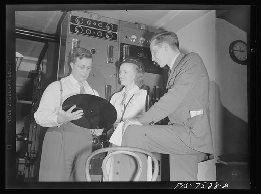 Untitled photo, possibly related to: Washington, D.C. Foreign students at the International student assembly recording short talks in their native language, to be broadcast by shortwave after censorship by the Office of War Information (OWI) to Nazi-held territory. Filla, a Norwegian, was interested