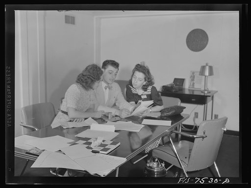 Untitled photo, possibly related to: Washington, D.C. Foreign students at the international student assembly recording short talks in their native language to be broadcast by shortwave, after censorship by the Office of War Information (OWI), to Nazi-held territory. French group preparing speeches f