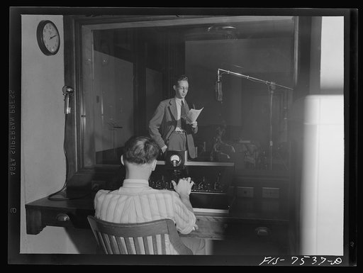 Washington, D.C. Foreign students at the international student assembly recording short talks in their native language to be broadcast by shortwave, after censorship by the Office of War Information (OWI), to Nazi-held territory. Toy speaking Norwegian. The recording technician is in the background