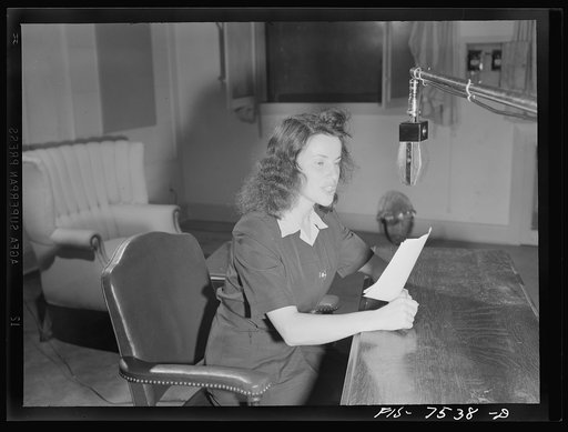 Untitled photo, possibly related to: Washington, D.C. Foreign students at the International student assembly recording short talks in their native language to be broadcast by shortwave after censorship by the Office of Ware Information (OWI) to Nazi-held territory. Niquett, speaking in French and Fl