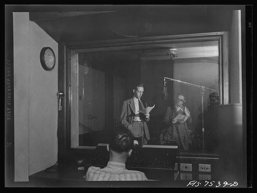 Washington, D.C. Foreign students at the international student assembly recording short talks in their native language to be broadcast by shortwave, after censorship by the Office of War Information (OWI), to Nazi-held territory. Toy speaking Norwegian. The recording technician is in the background