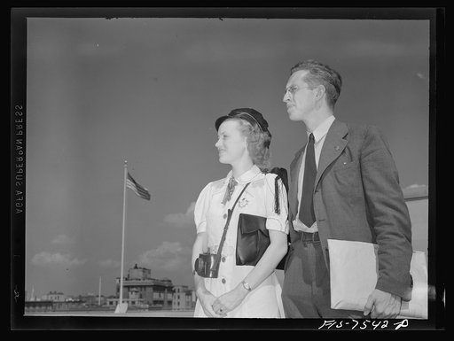 Washington, D.C. Foreign students at the international student assembly recording short talks in their native language to be broadcast by shortwave, after censorship by the OWI (Office of War Information), to Nazi-held territory. Filla and Toy speaking in Norwegian. The girl in a Norwegian college s