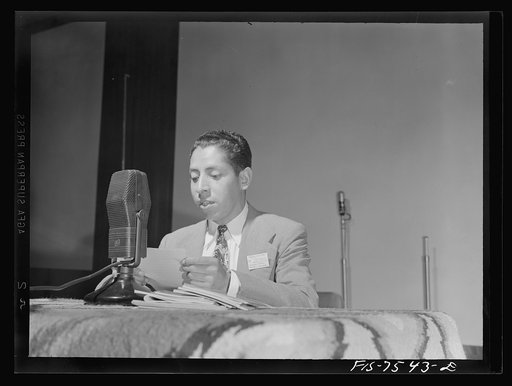 Washington, D.C. Foreign students at the international student assembly recording short talks in their native language to be broadcast by short wave, after censorship by the Office of War Information (OWI), to Nazi-held territory. Enrigue Avila of Peru