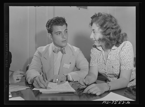 Untitled photo, possibly related to: Washington, D.C. Foreign students at the international student assembly recording short talks in their native language to be broadcast by shortwave, after censorship by the Office War Information (OWI), to Nazi-held territory. French group preparing speeches for 
