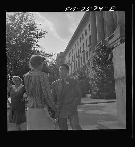 Washington, D.C. International student assembly. A.T. Lui, a student at the University of Michigan, a Chinese delegate, talking to a Swedish delegate