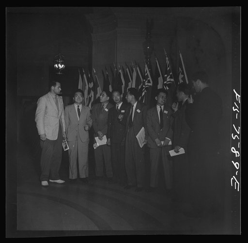 Untitled photo, possibly related to: Washington, D.C. International youth assembly. British and Chinese delegates in the lobby