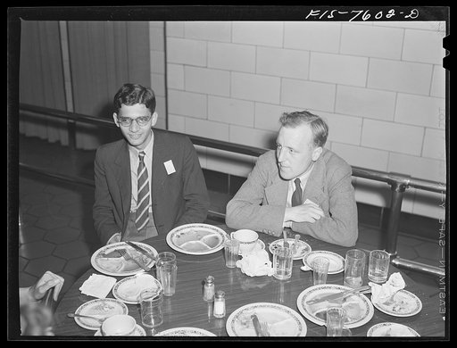 Untitled photo, possibly related to: Washington, D.C. International youth assembly. A delegate from India, left, and one from Great Britain, having lunch in the Department of Labor cafeteria