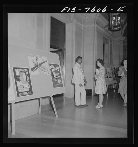 Washington, D.C. International youth assembly. Delegate from Nigeria, left, chatting with an American student in the lobby