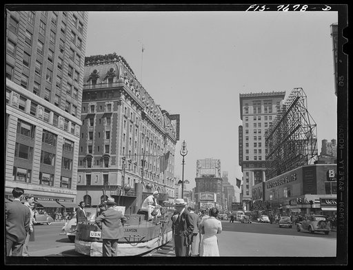 New York, New York. Times Square showing U.S. Navy's model battleship recruiting station