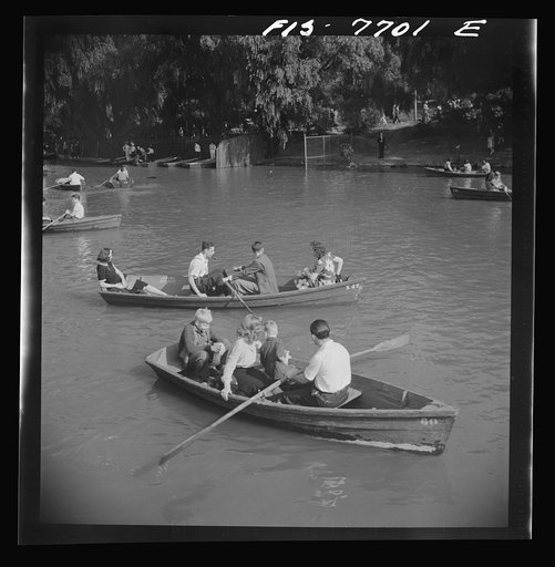 Untitled photo, possibly related to: New York, New York. Central Park lake on Sunday looking east