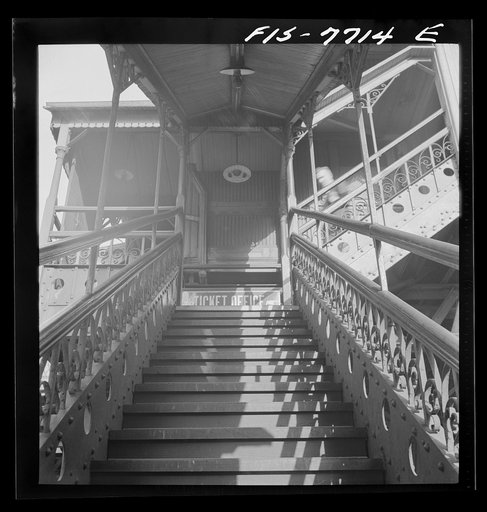 Untitled photo, possibly related to: New York, New York. Third Ave elevated railway steps at the 94th Street Station in the early morning