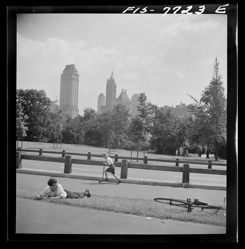 New York, New York. Looking south across a bicycle path in Central Park on Sunday
