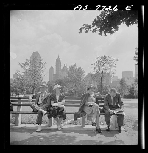New York, New York Sunday sitters near the mall, in Central Park, looking south