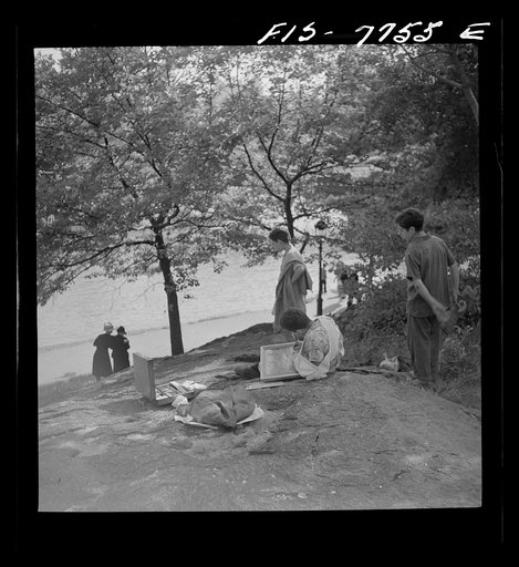 New York, New York. Artist in Central Park near the lake