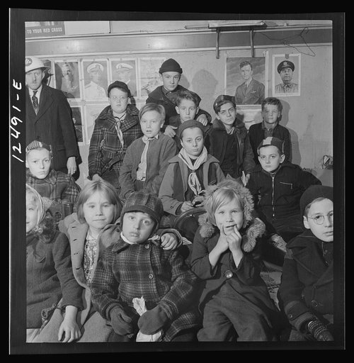 Untitled photo, possibly related to: Chicago (north), Illinois. Boy Scouts who was one of the first to arrive for the flag dedication ceremony