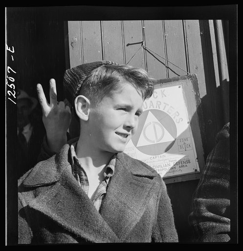 Untitled photo, possibly related to: Chicago (north), Illinois. One of the ace Junior Rangers responsible for bringing in a great amount of scrap to his block Office of Civilian Defense headquarters