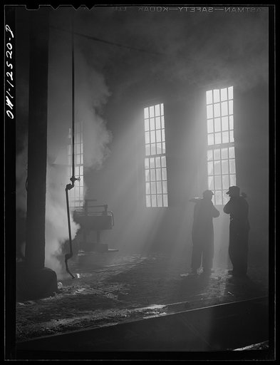 Untitled photo, possibly related to: Chicago, Illinois. In the roundhouse at a Chicago and Northwestern Railroad yard