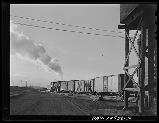 Chicago, Illinois. Making up a train in one of the yards of the Chicago and Northwestern Railroads