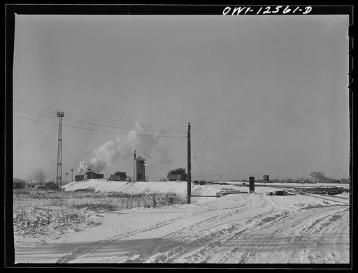 Chicago, Illinois. Two gondola cars going down the hump tracks at a yard of the Chicago and Northwestern Railroad