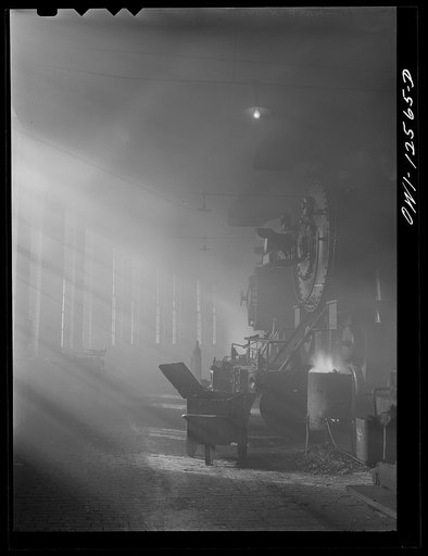 Untitled photo, possibly related to: Chicago, Illinois. In the roundhouse at a yard of the Chicago and Northwestern Railroad