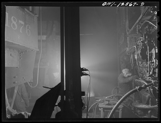 Chicago, Illinois. Working on locomotives in the roundhouse at a yard of the Chicago and Northwestern Railroad