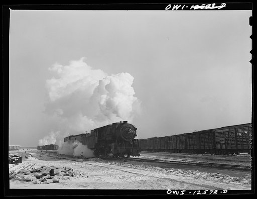 Chicago, Illinois. Freight train pulling out of a Chicago and Northwestern Railroad yard