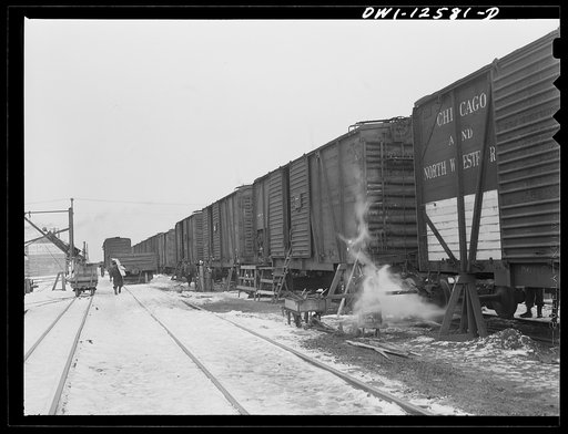 Chicago, Illinois. Cars on the repair track at a yard of the Chicago and Northwestern Railroad