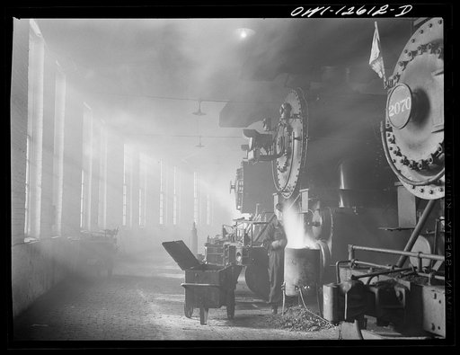 Untitled photo, possibly related to: Chicago, Illinois. In the roundhouse at a yard of the Chicago and Northwestern Railroad