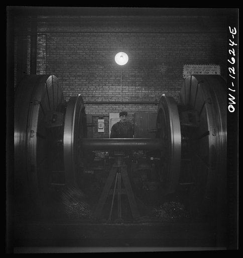 Untitled photo, possibly related to: Chicago, Illinois. Refacing tires on locomotive's wheels at a Chicago and Northwestern Railroad shop
