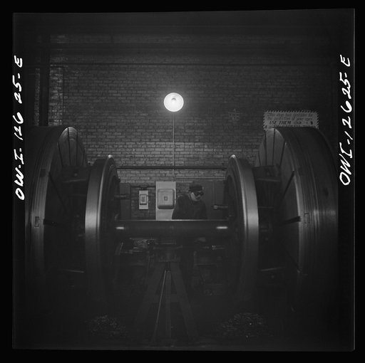 Chicago, Illinois. Refacing tires on locomotive's wheels at a Chicago and Northwestern Railroad shop