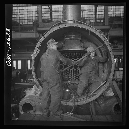 Chicago, Illinois. Working on a locomotive at the Chicago and Northwestern Railroad repair shops