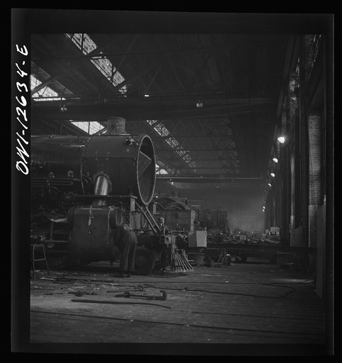 Untitled photo, possibly related to: Chicago, Illinois. In the Chicago and Northwestern locomotive repair shop