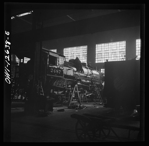 Untitled photo, possibly related to: Chicago, Illinois. In the Chicago and Northwestern locomotive repair shop