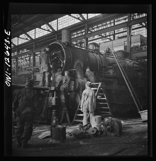 Chicago, Illinois. Working on a locomotive at the Chicago and Northwestern Railroad repair shop