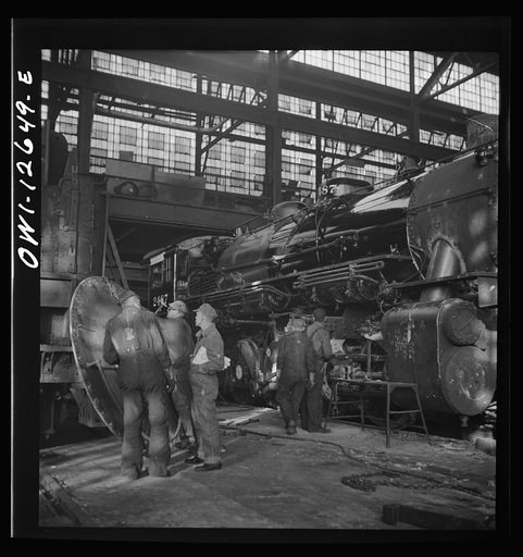 Chicago, Illinois. Working on a locomotive at the Chicago and Northwestern Railroad