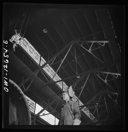 Chicago, Illinois. A welder at the Chicago and Northwestern Railroad shops
