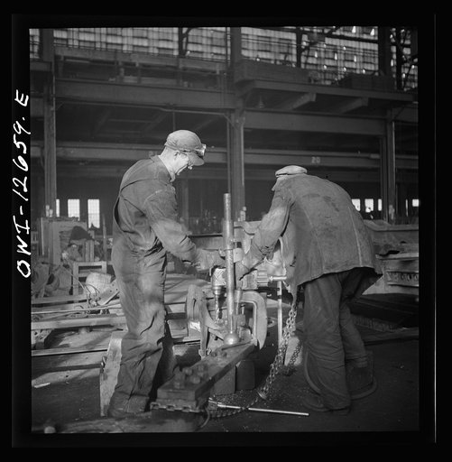 Untitled photo, possibly related to: Chicago, Illinois. In the Chicago and Northwestern Railroad repair shops