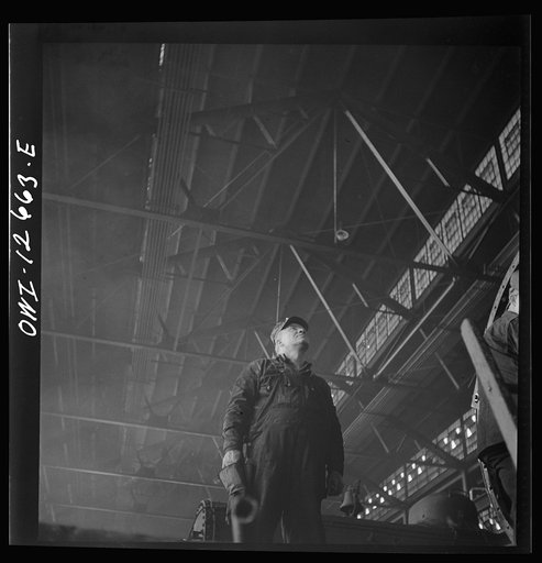 Chicago, Illinois. A welder's helper in the Chicago and Northwestern Railroad repair shop